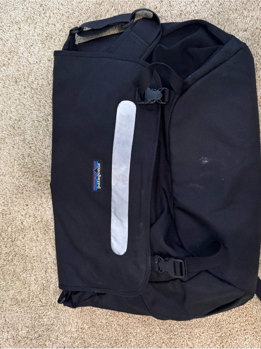 Patagonia Black Messenger Bag with Silver Reflective Strip